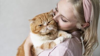 close-up-woman-kissing-cat